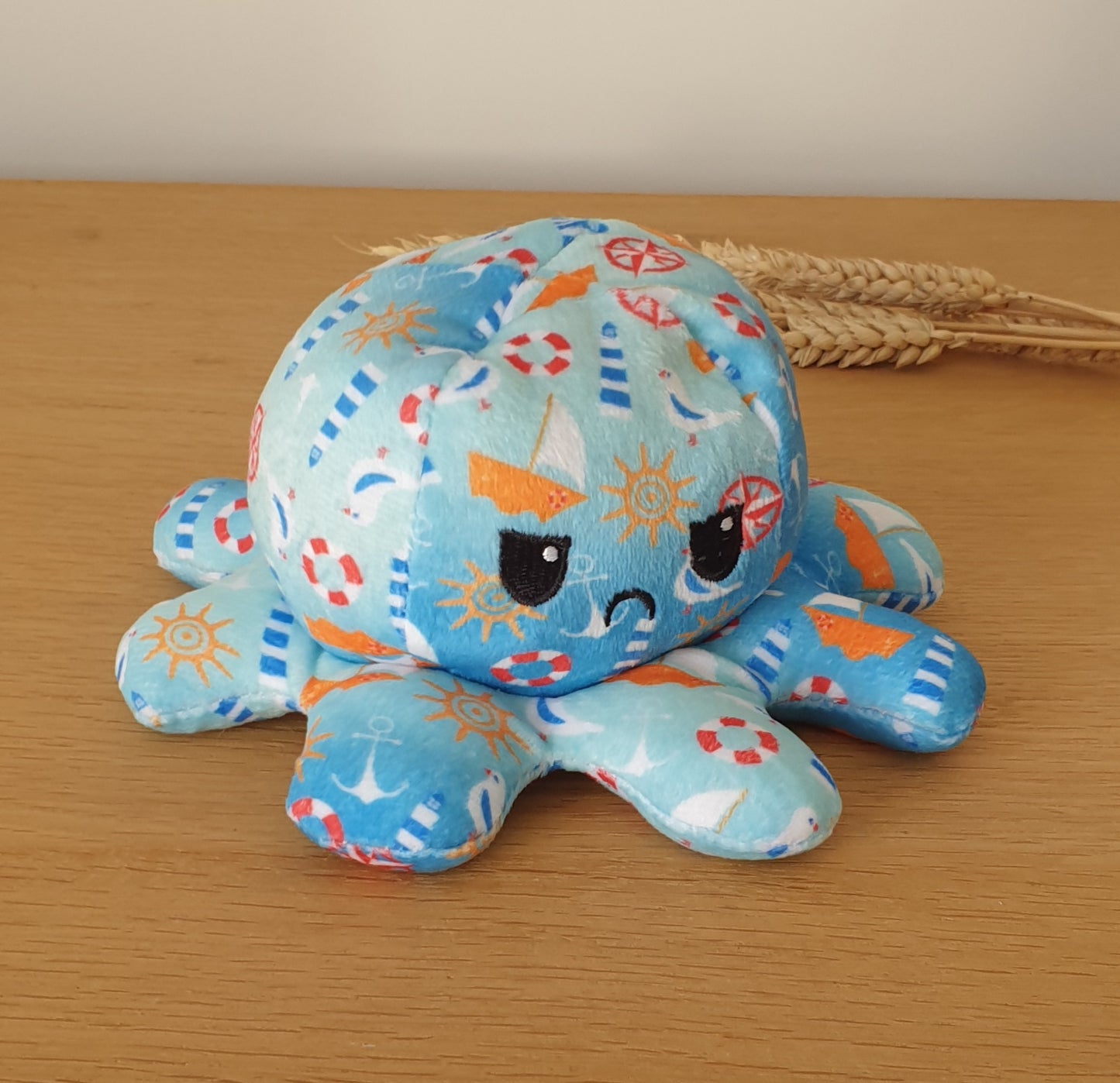 Reversible octopus plush toy