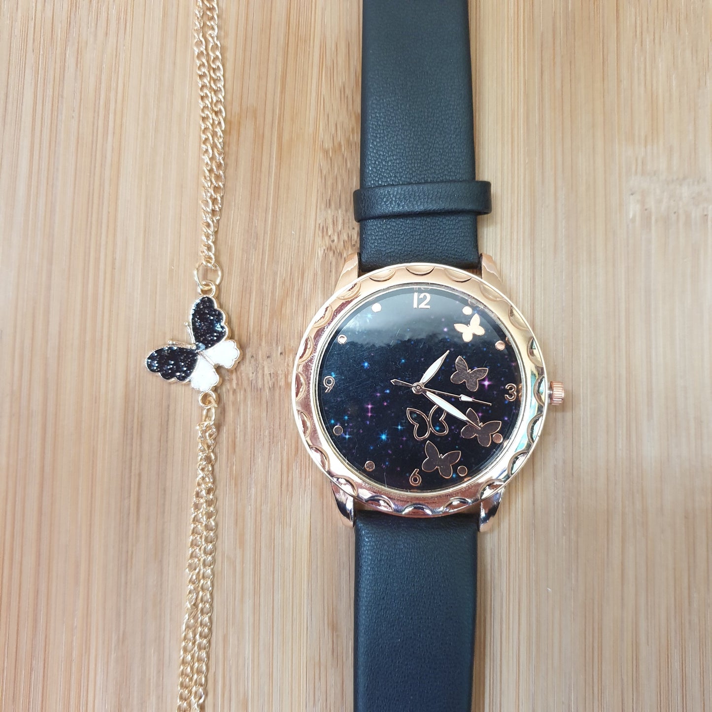 Women watch butterflies black