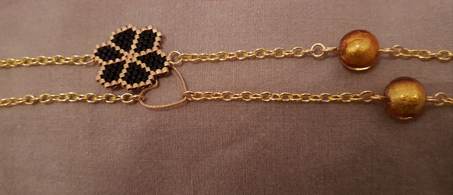 Long necklace black and gold