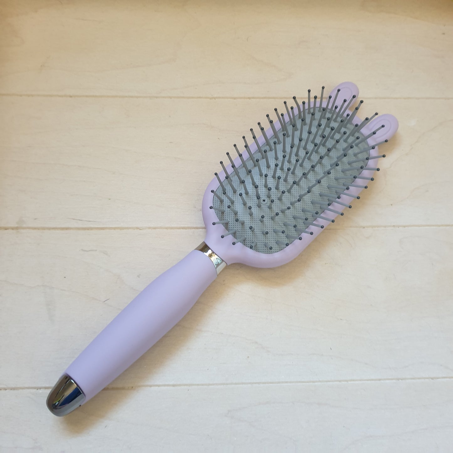 Purple hair brush