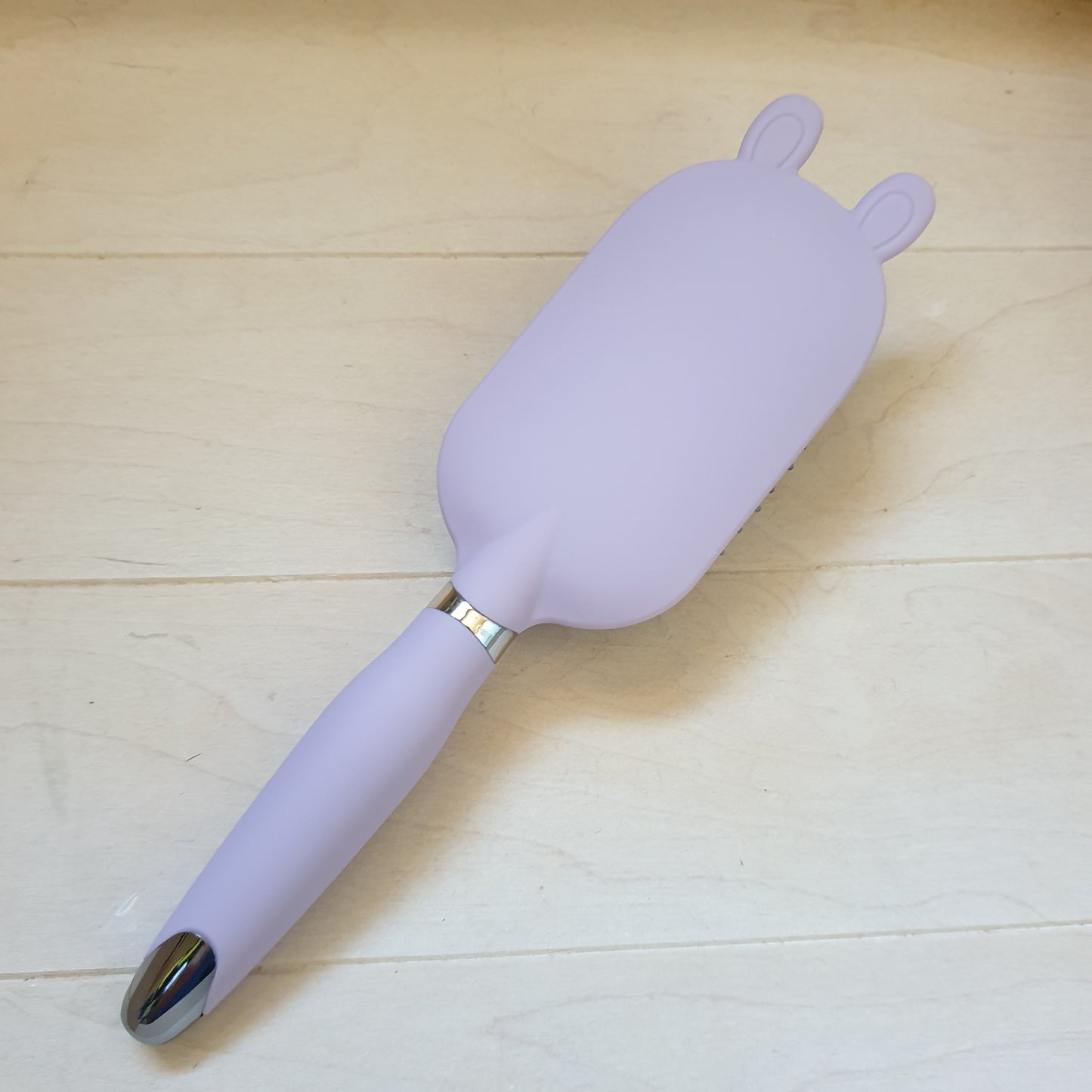 Purple hair brush