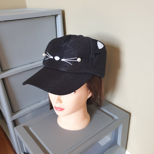 Adjustable black cap cat