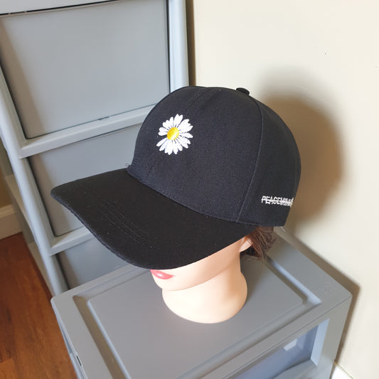 Adjustable black cap flower